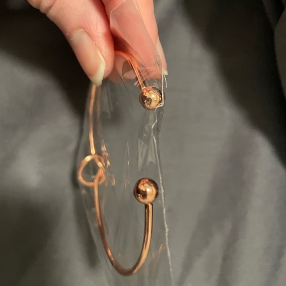 rose gold tone adjustable bangle bracelet with round knot - Picture 2 of 6